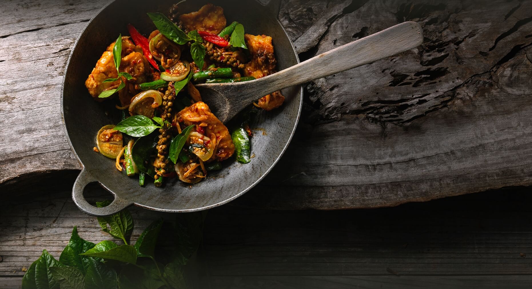 Open kitchen showcasing Thai cooking