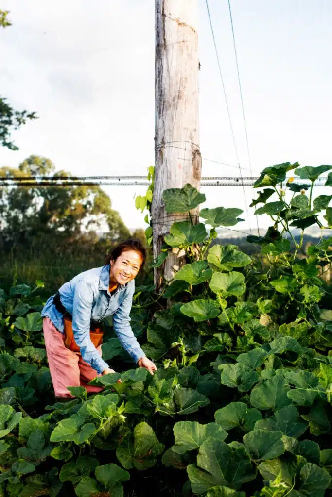 Palisa Anderson taking care of her garden
